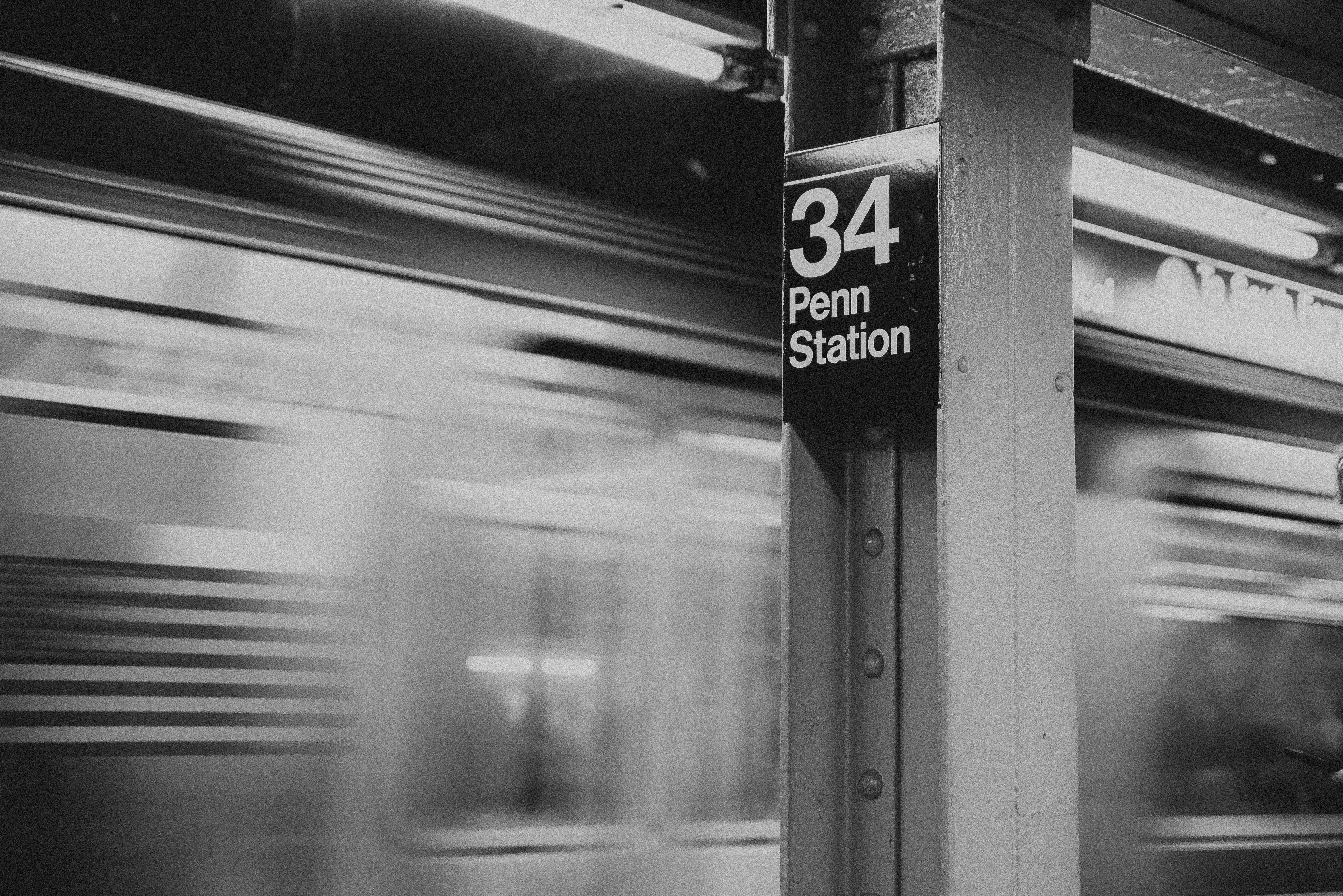 grayscale photo of train station